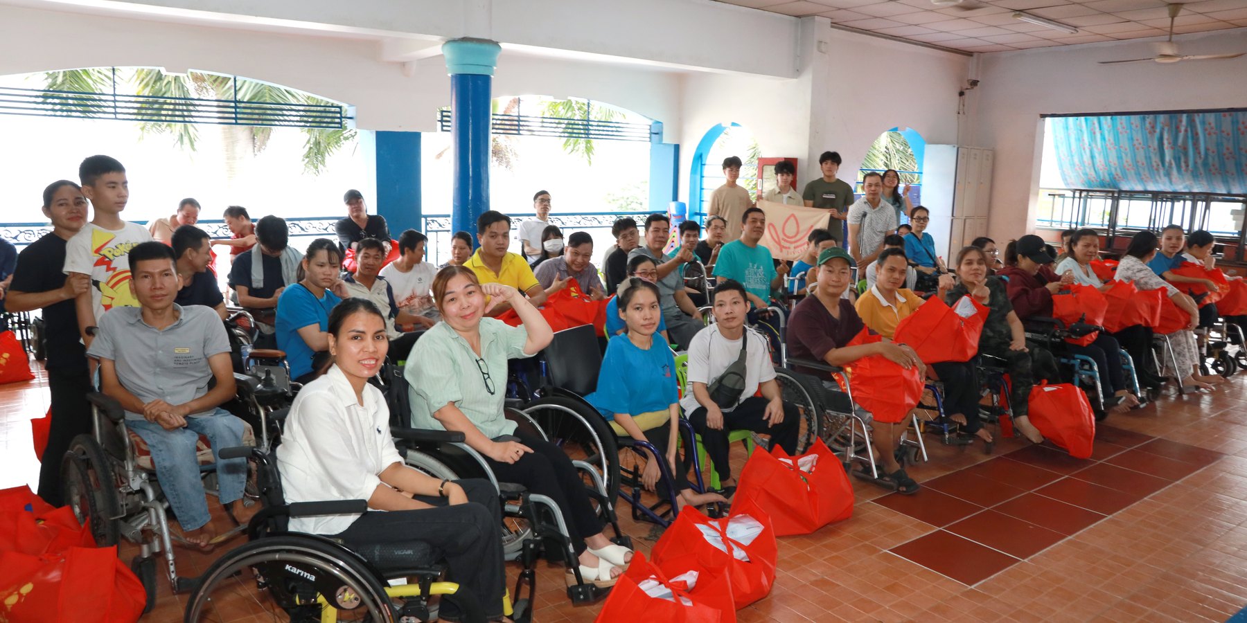 The full room at Làng May Mắn with Tết gifts ready to hand out
